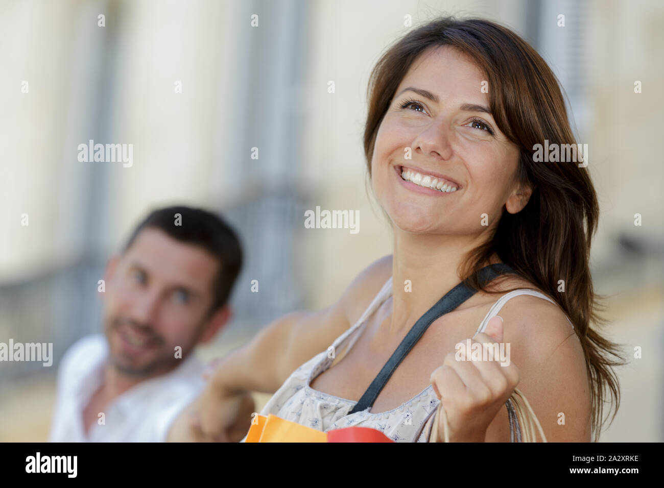 Girlfriend Pulling Her Boyfriend To Go Shopping Stock Photo Alamy girlfriend-pulling-her-boyfriend-to-go-shopping-stock-photo-alamy