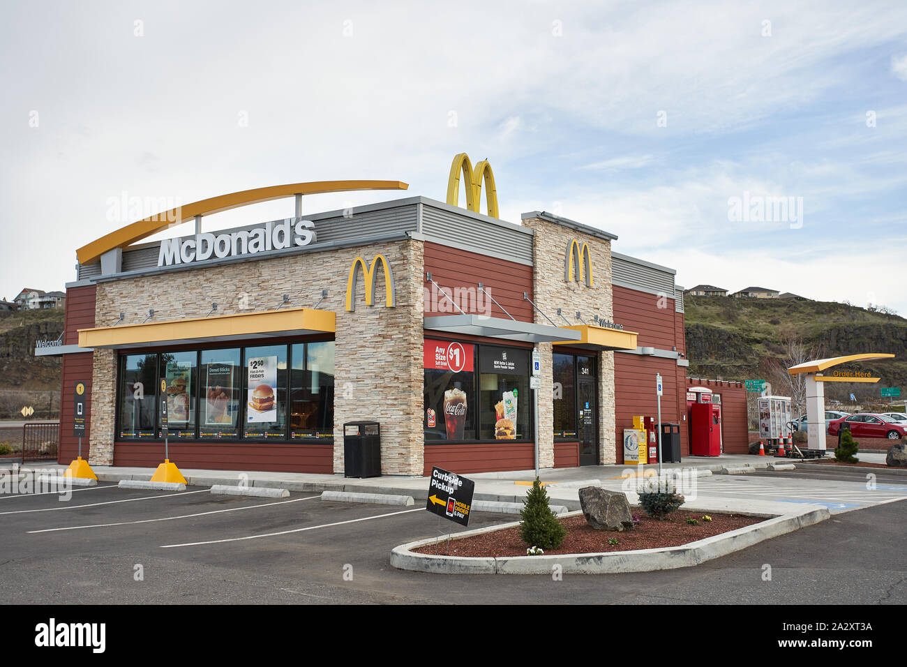 The Dalles, Oregon, USA - Mar 28, 2019: The exterior of a contemporary McDonald's restaurant. Stock Photo