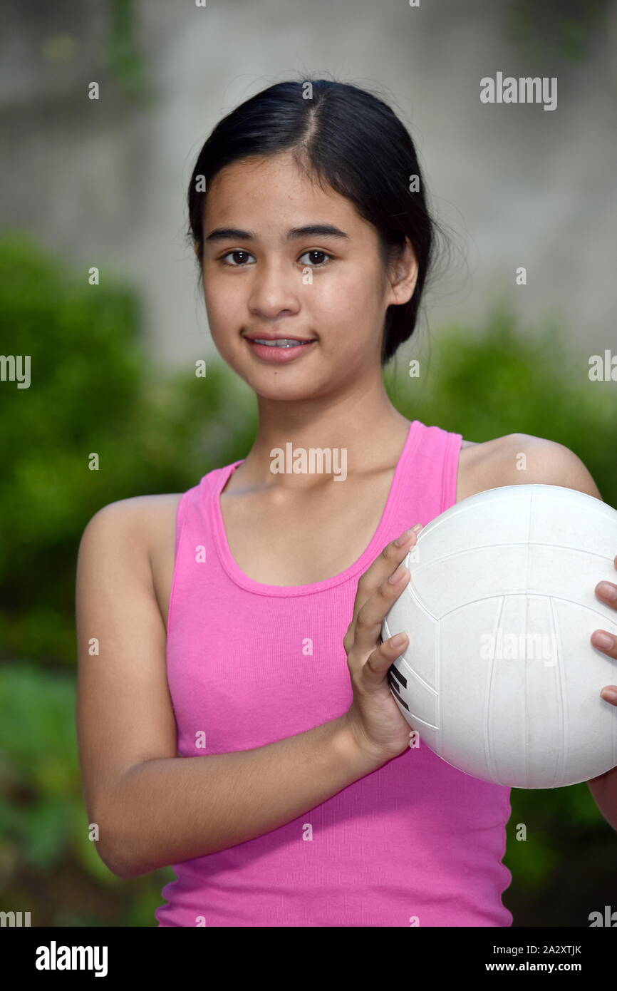 Happy Diverse Female Athlete With Volleyball Stock Photo