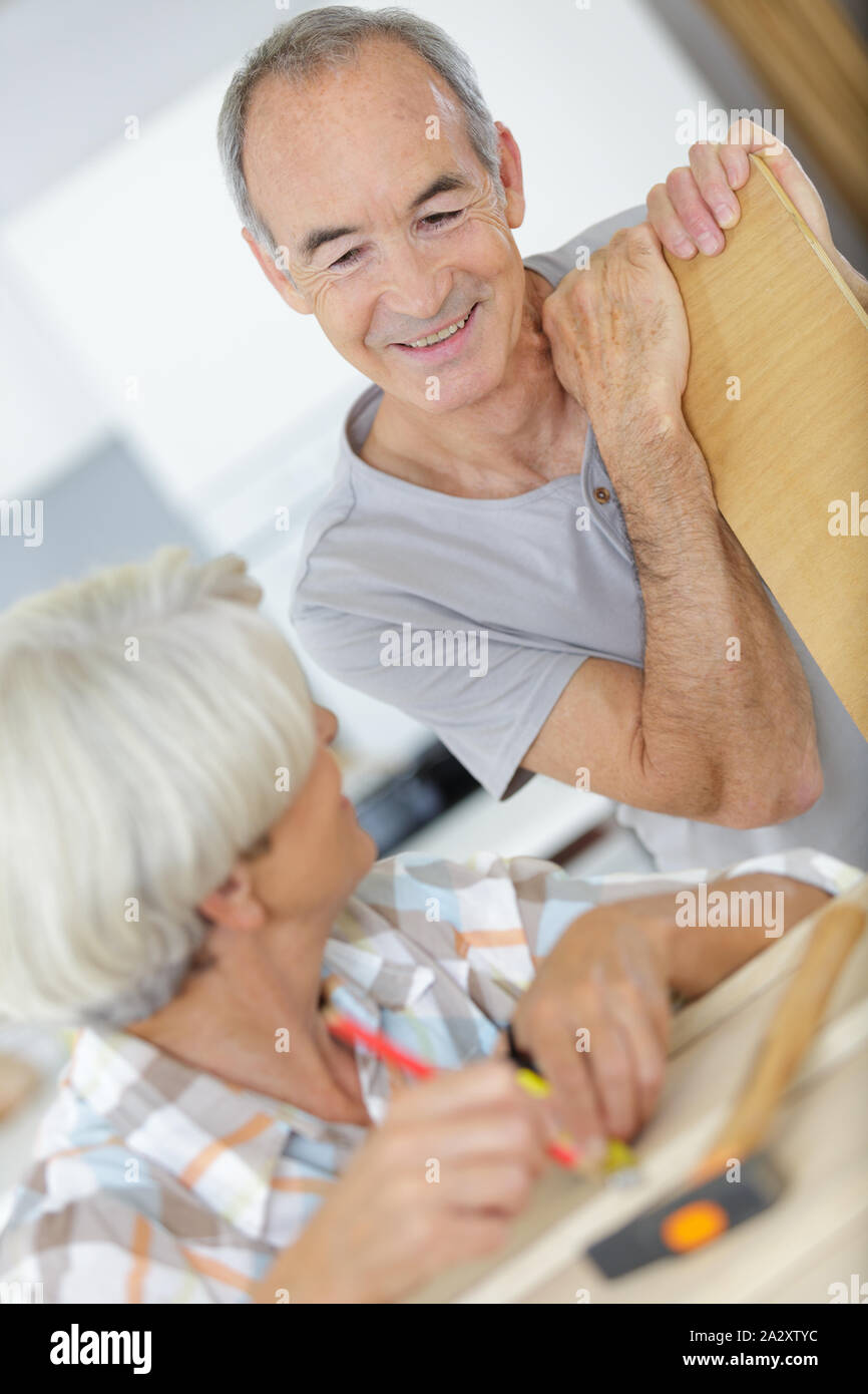 couple senior doing diy at home Stock Photo