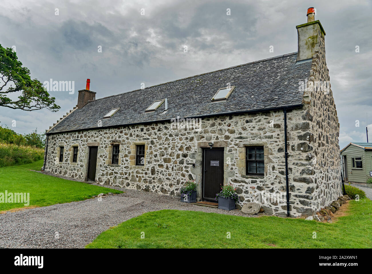 Dunvegan Castle Cottage On The Isle Of Skye Views Stock Photo