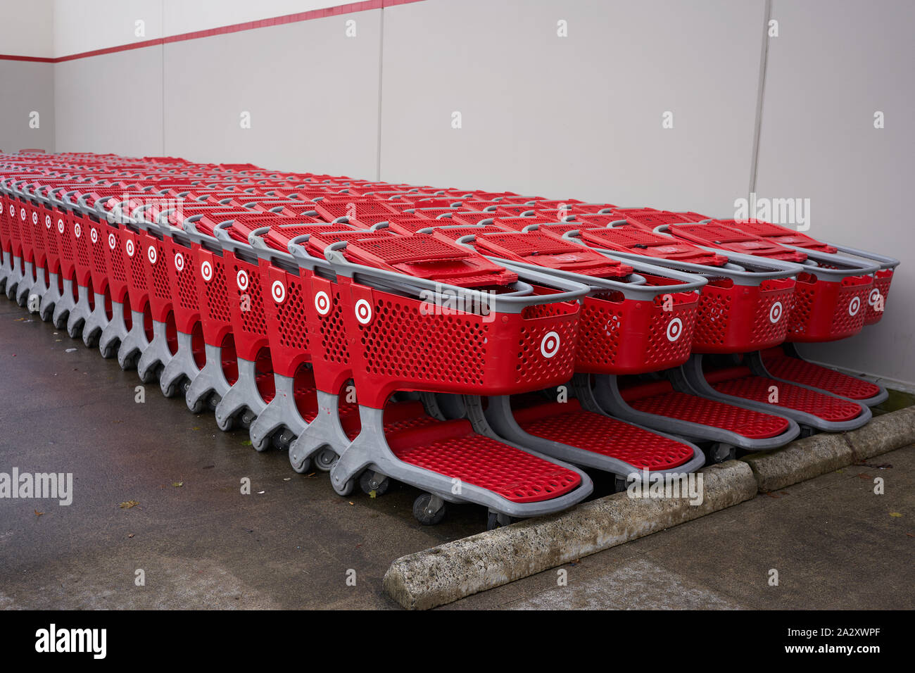 Rows of Target branded shopping carts are seen parked outside a Target Store in Tigard, Oregon, on Wednesday, Sep 18, 2019. Stock Photo