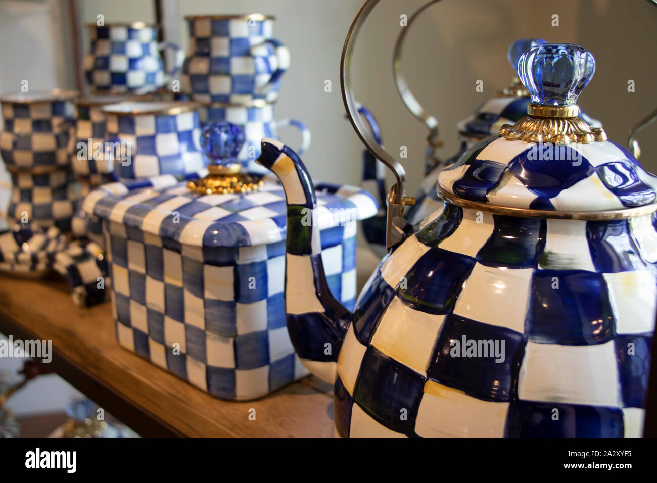 Aurora, New York, USA - July 27, 2019: Charming Blue and White Royal Check Enamelware Display at Mackenzie Childs shop, Finger Lakes, New York State Stock Photo