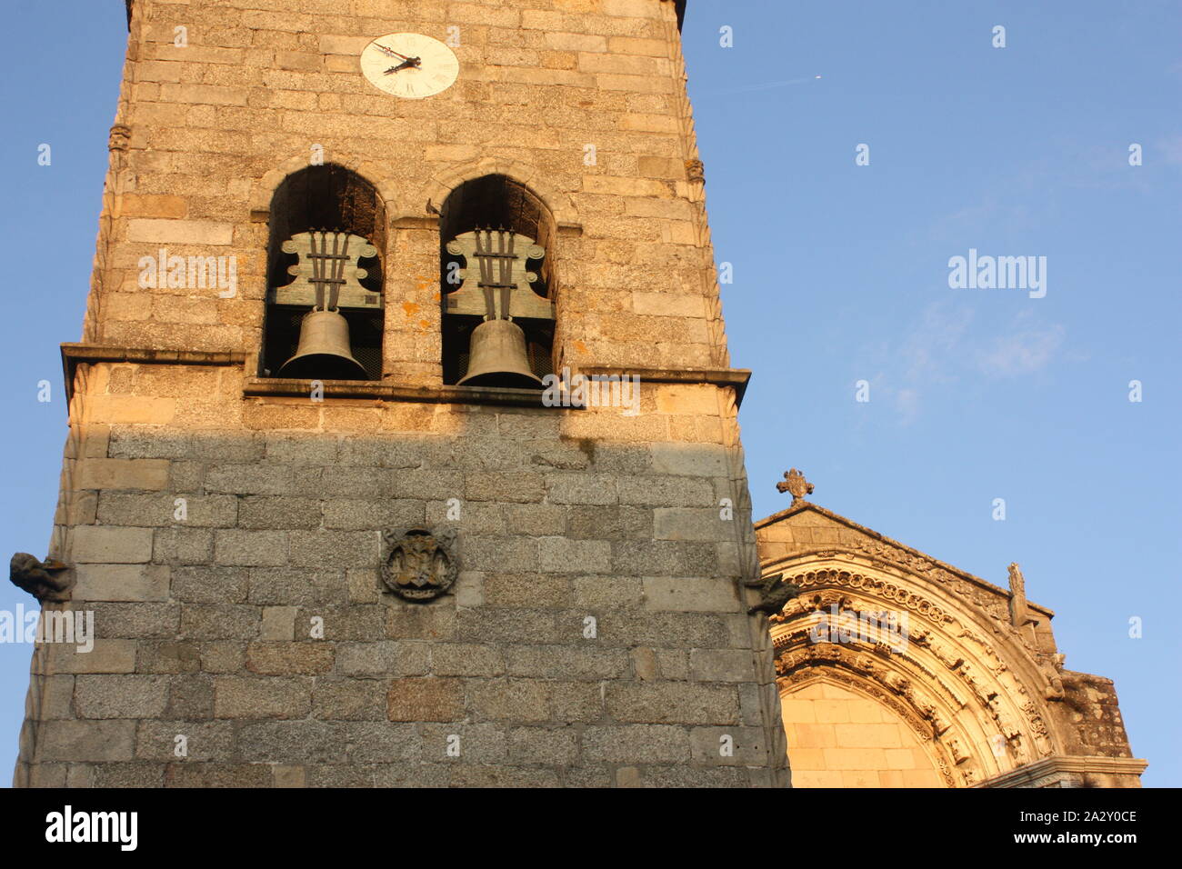 Guimaraes, Portugal - The tower of the Igreja de Nossa Senhora da Oliveira - taken at 7:50pm Stock Photo