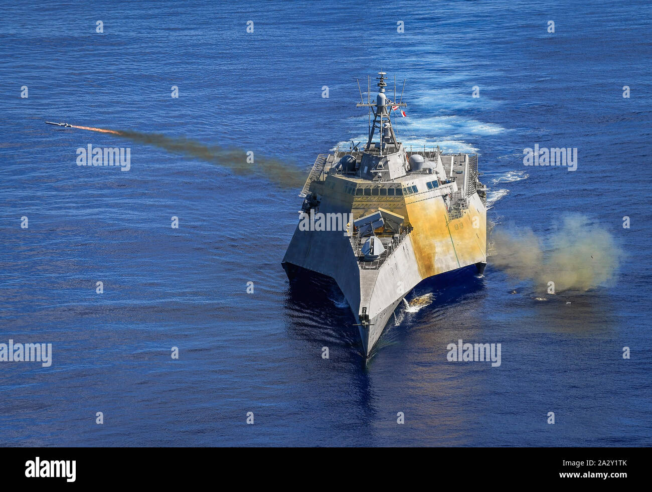 191001-N-FC670-004  PHILIPPINE SEA (Oct. 1, 2019) Independence-variant littoral combat ship USS Gabrielle Giffords (LCS 10) launches a Naval Strike Missile (NSM) during exercise Pacific Griffin. The NSM is a long-range, precision strike weapon that is designed to find and destroy enemy ships. Pacific Griffin is a biennial exercise conducted in the waters near Guam aimed at enhancing combined proficiency at sea while strengthening relationships between the U.S. and Republic of Singapore navies. (U.S. Navy photo by Chief Mass Communication Specialist Shannon Renfroe/Released) Stock Photo