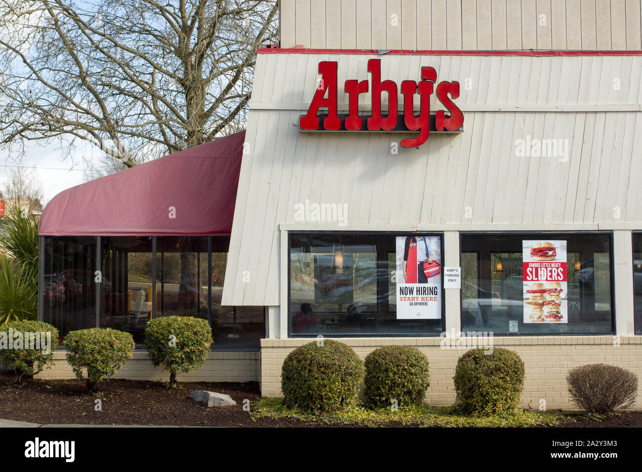 Beaverton, Oregon - Mar 12, 2019: The exterior of an Arby's restaurant. Arby's is an American quick-service fast-food sandwich restaurant chain. Stock Photo