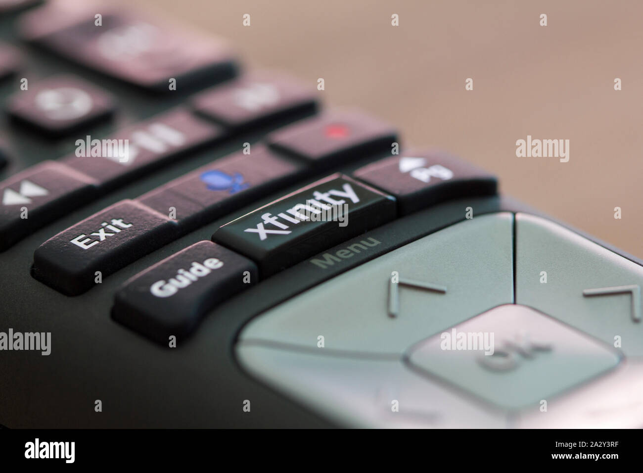Portland, OR - May 8, 2019: The Xfinity X1 TV remote control with voice commands functionality. Xfinity is a trade name of Comcast. Stock Photo