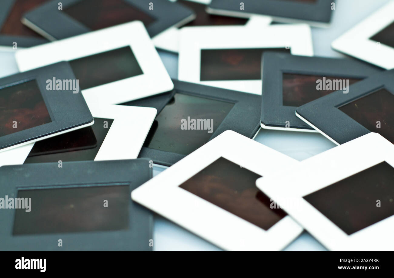 old slide projector film stack on white background Stock Photo Alamy