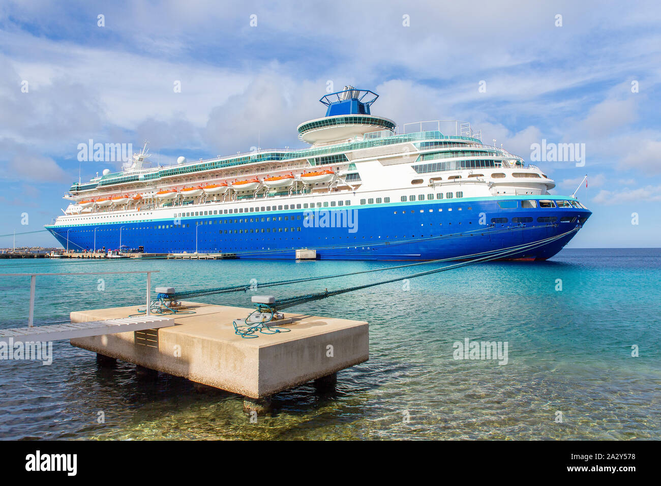 Large blue passenger ship  anchored on coast of Bonaire Stock Photo
