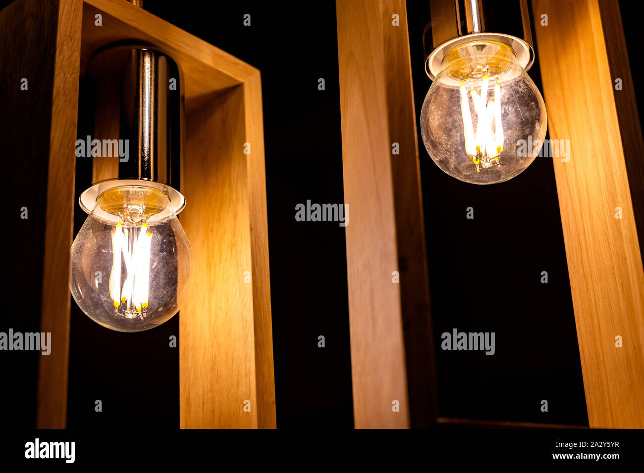 Light bulb glowing in the dark Stock Photo Alamy