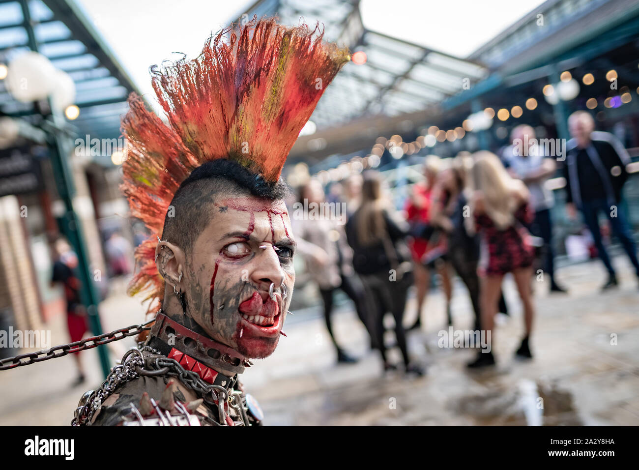 The extreme body-modified ‘Zombiepunk’ attends the 15th International London Tattoo Convention at Tobacco Dock, UK. Stock Photo