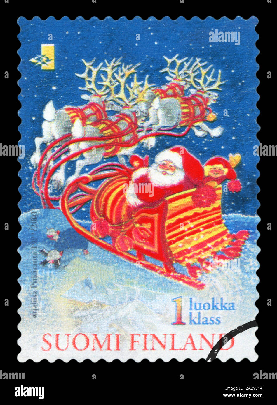 FINLAND - CIRCA 1991: stamp printed by Finland, shows Reindeer pulling Santa sleigh, circa 1991 Stock Photo