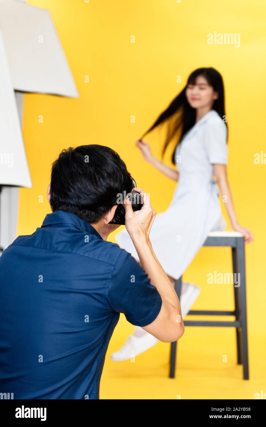 Behind the scenes, photographers are using cameras and lenses to