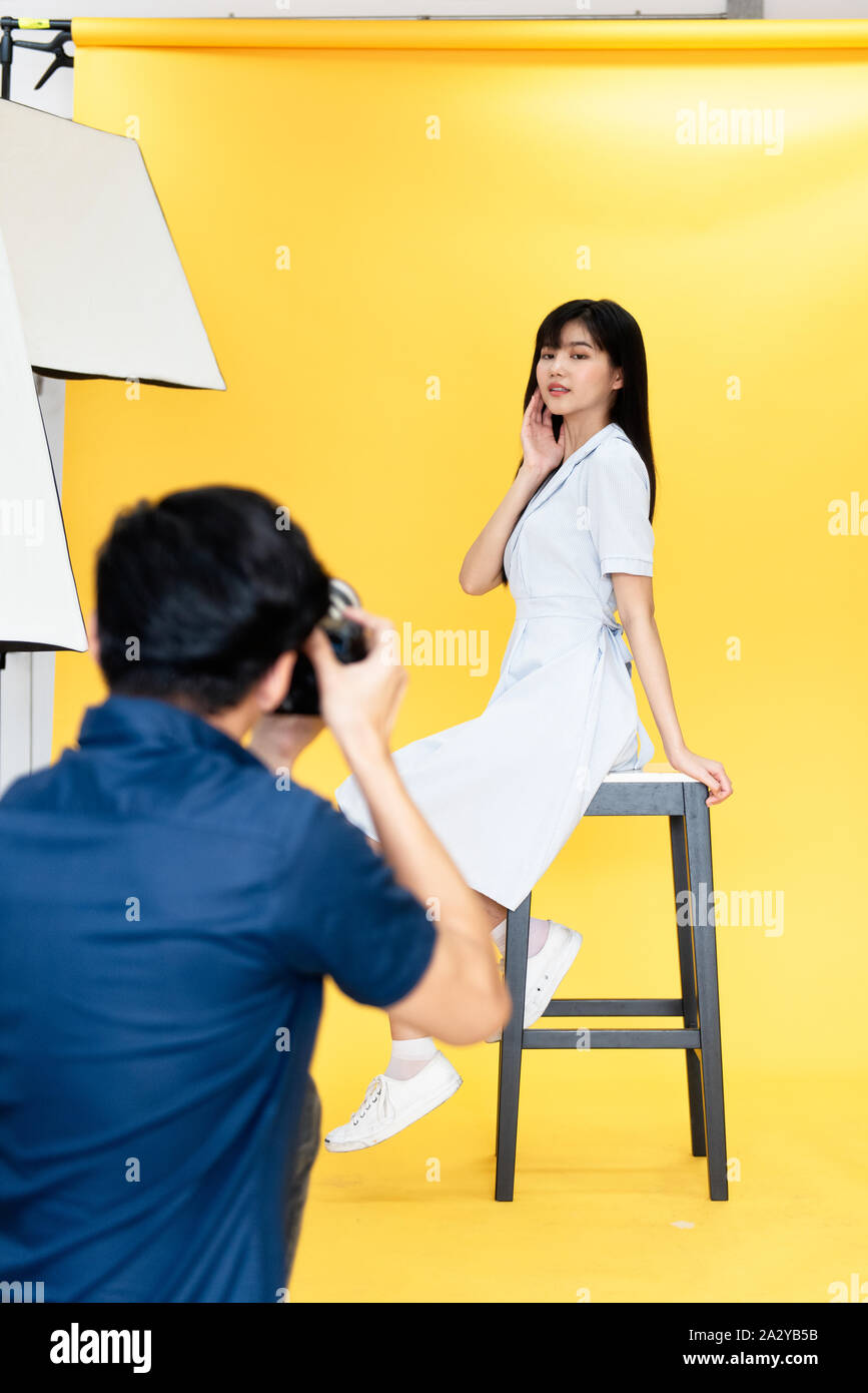 Behind the scenes, photographers are using cameras and lenses to