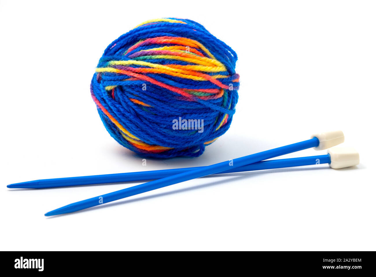 Knitting needles and yarn on a white background Stock Photo