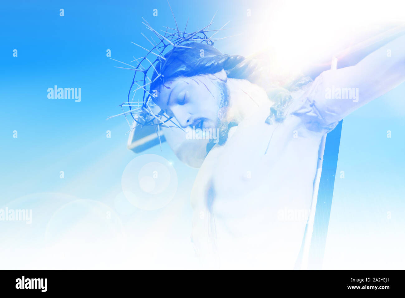 Jesus Christ on the cross against a background of blue sky Stock Photo ...