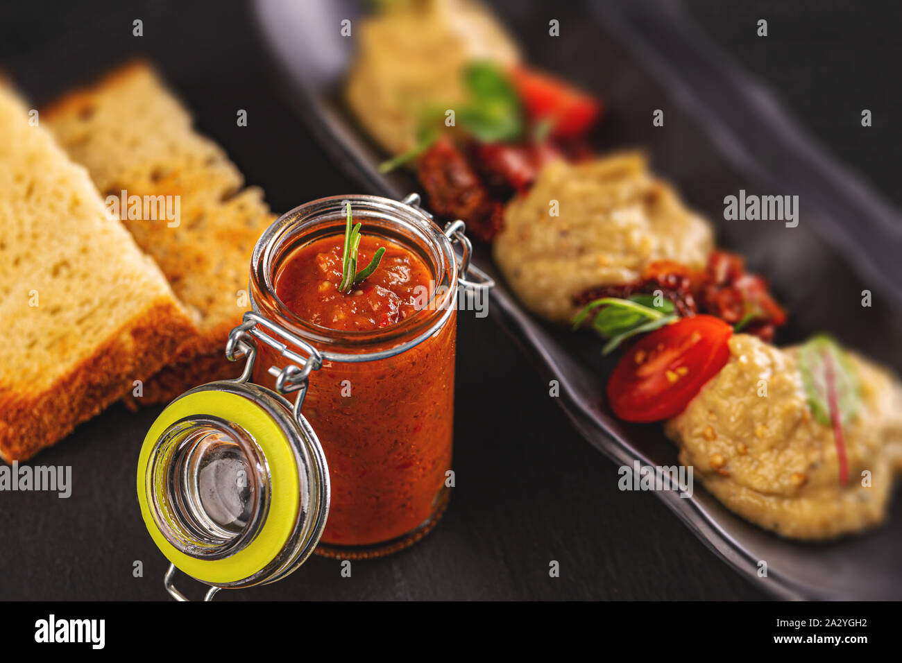 Transylvanian vegetable spread and eggplant cream served with toast Stock Photo