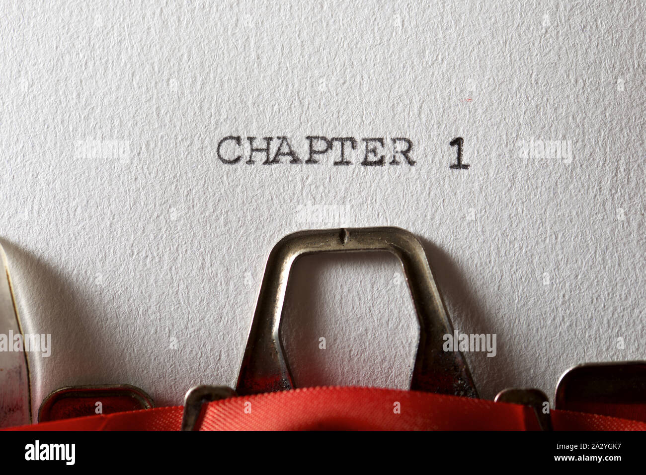 The sentence, Chapter 1, written with a typewriter Stock Photo - Alamy