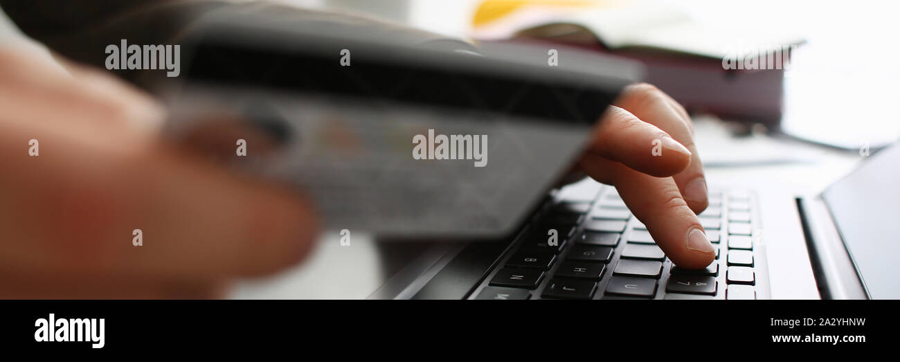 Male arms hold credit card press buttons making transfer Stock Photo ...