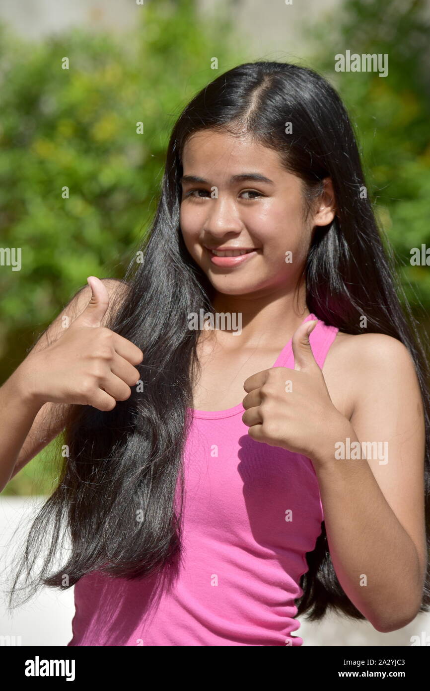 An A Youngster With Thumbs Up Stock Photo