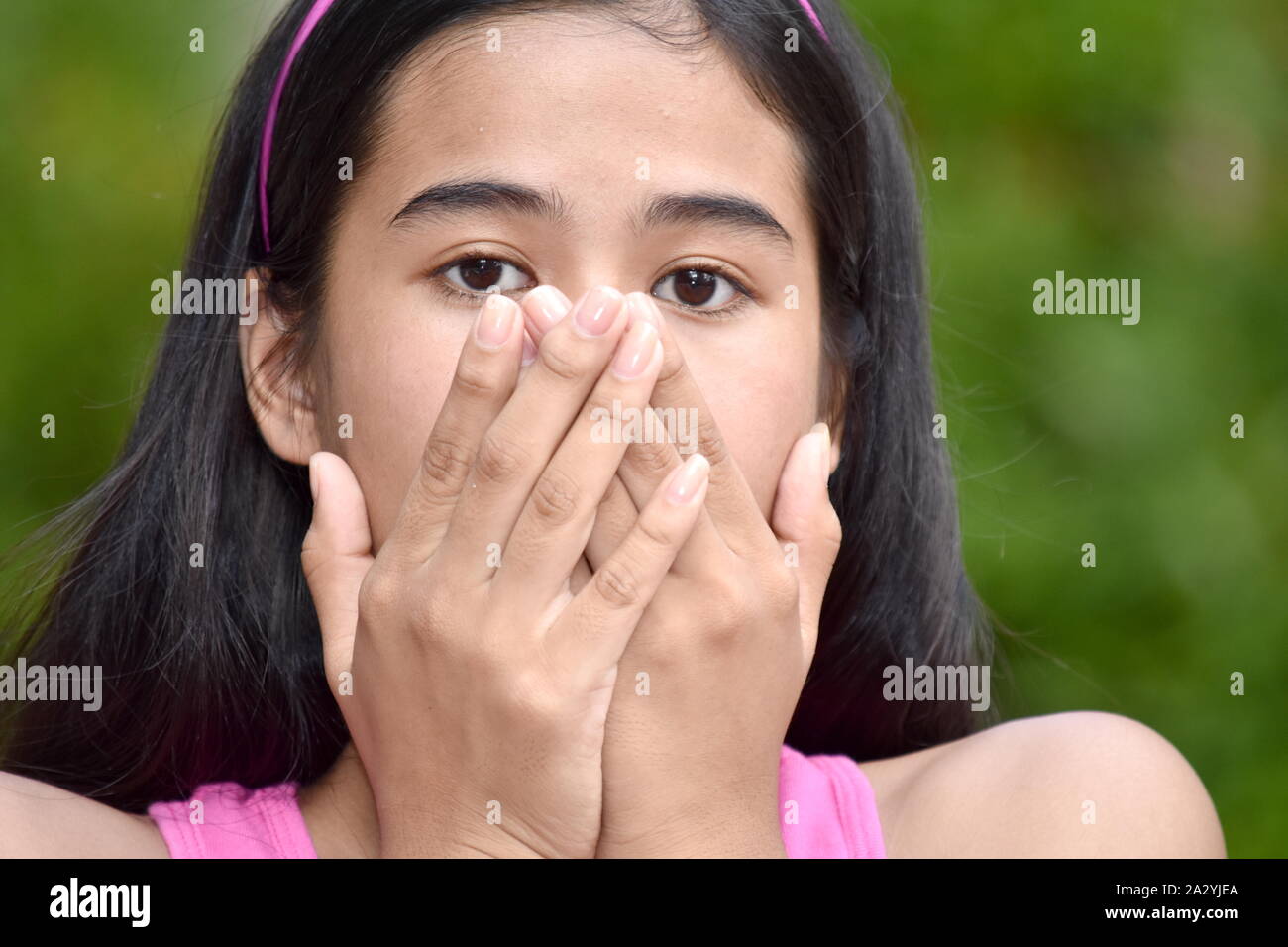 An A Startled Youthful Minority Person Stock Photo