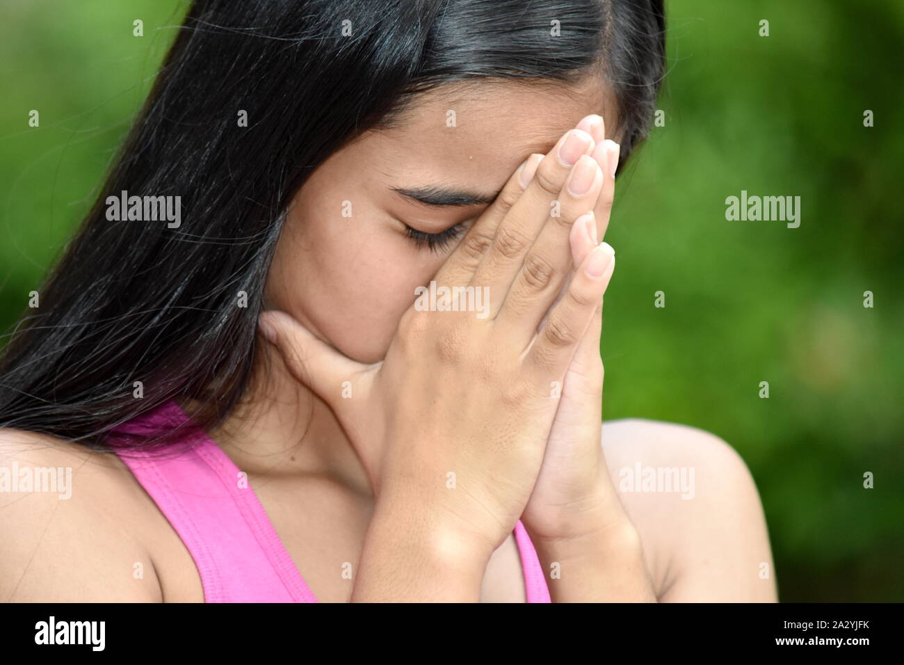 An A Female Youngster And Disappointment Stock Photo