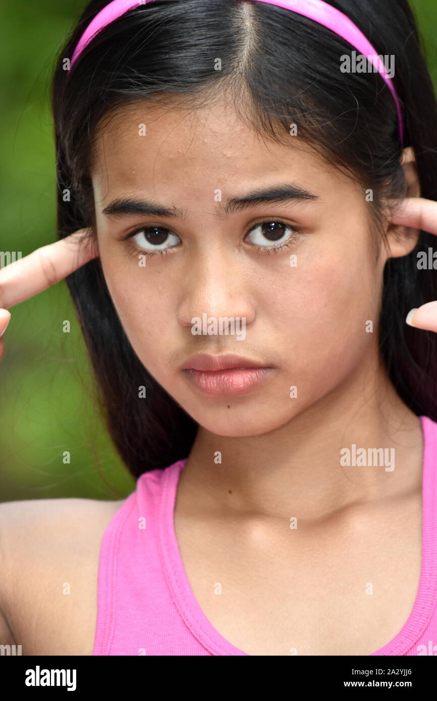 An A Quiet Beautiful Filipina Youngster Stock Photo
