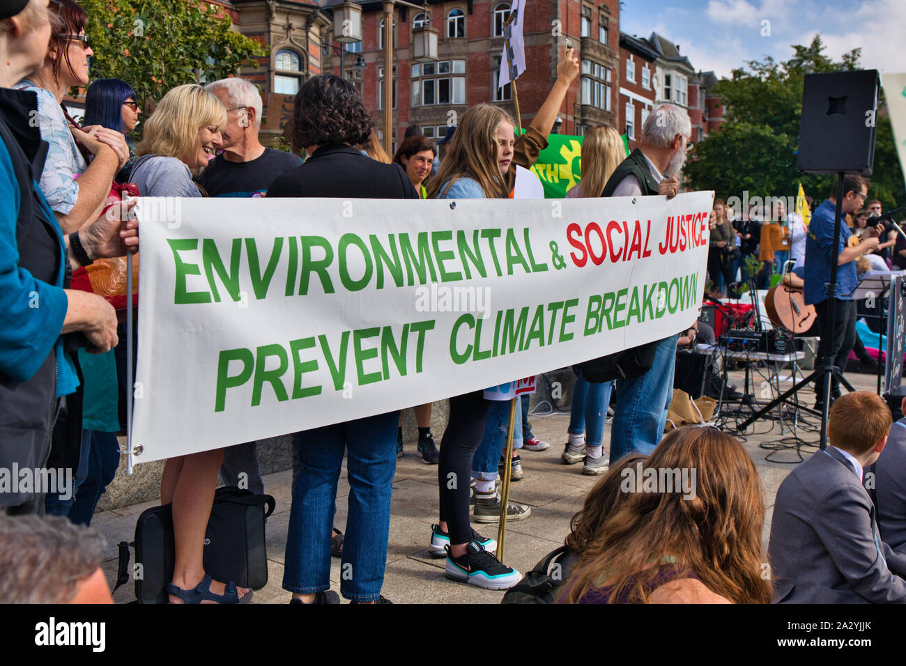 Climate change activists with banner, 20th September global climate strike, Old Market Square, East Midlands, Nottingham Stock Photo