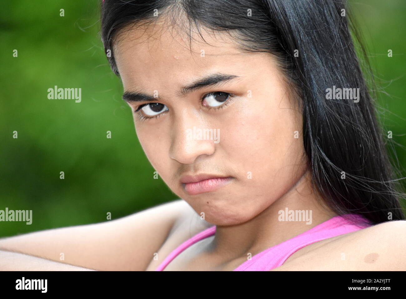An A Stubborn Youthful Teenager Girl Stock Photo