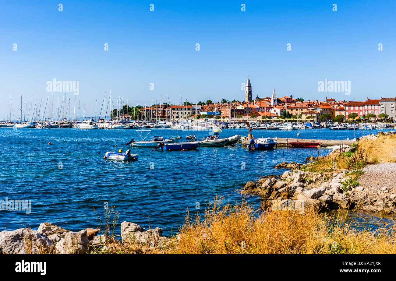 Izola, Slovenia: Panorama of an old fishing town in southwestern Slovenia on the Adriatic coast of the Istrian peninsula in the Mediterranean Sea. Stock Photo
