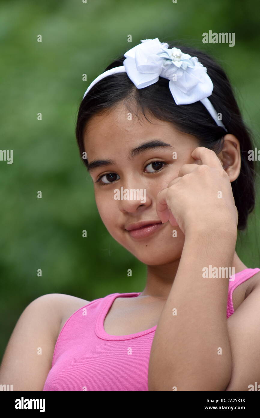 An An Unhappy Cute Filipina Female Stock Photo