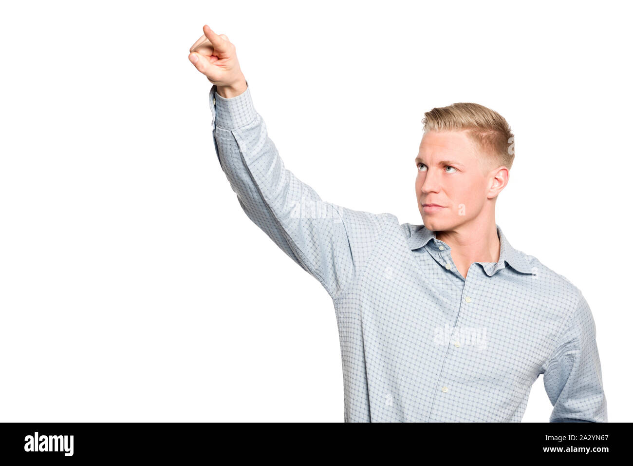 Focused businessman drawing with finger in the air Stock Photo Alamy