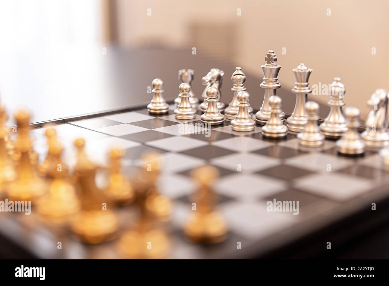 Premium Photo  Wooden chessboard with figures in light and dark brown  tones isolate on a white background