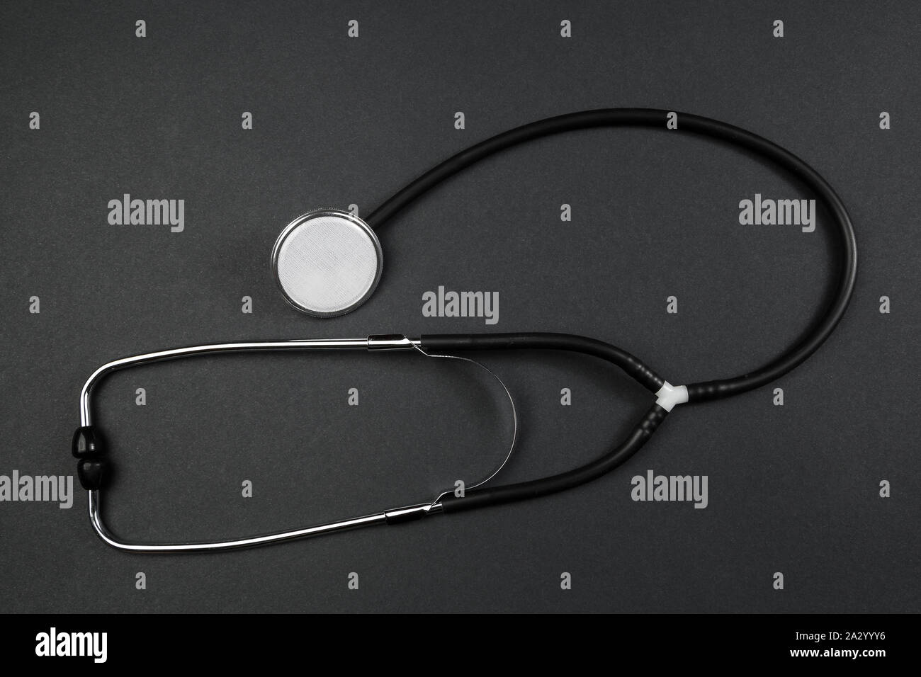 medical stethoscope on black isolated background Stock Photo - Alamy