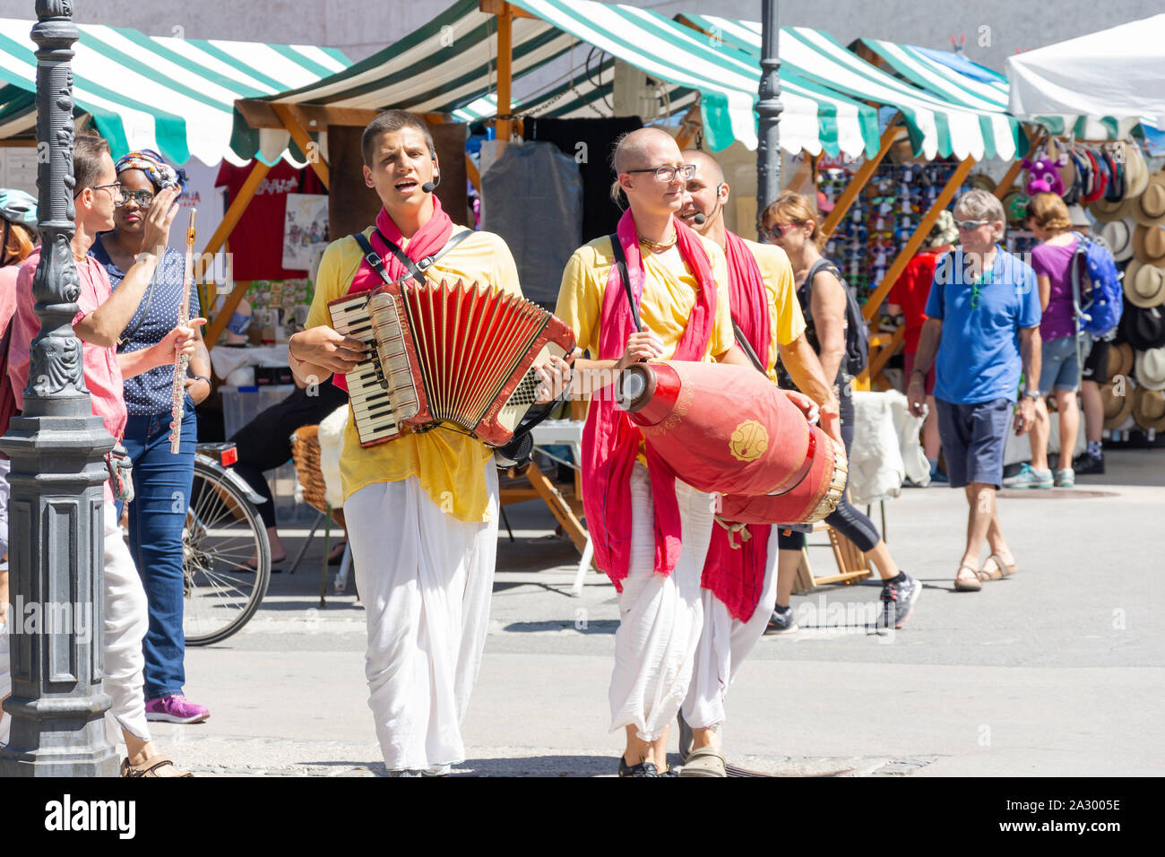 Hare Krishna followers chanting in street, Old Town, Ljubljana, Slovenia Stock Photo