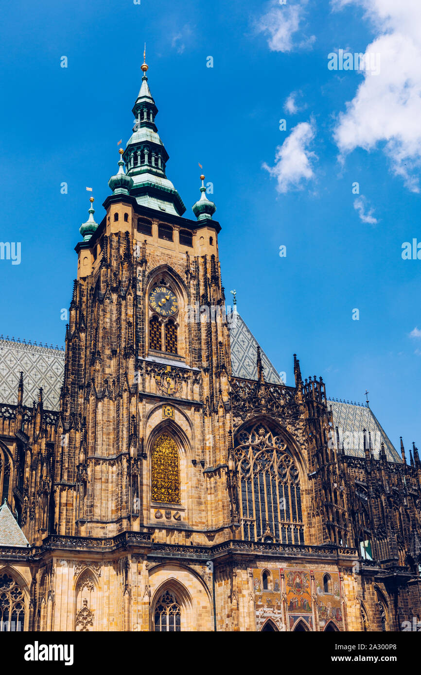 Prague, bell gothic towers and St. Vitus Cathedral. St. Vitus is a Roman Catholic cathedral in Prague, Czech Republic. Panoramic view from the courtya Stock Photo