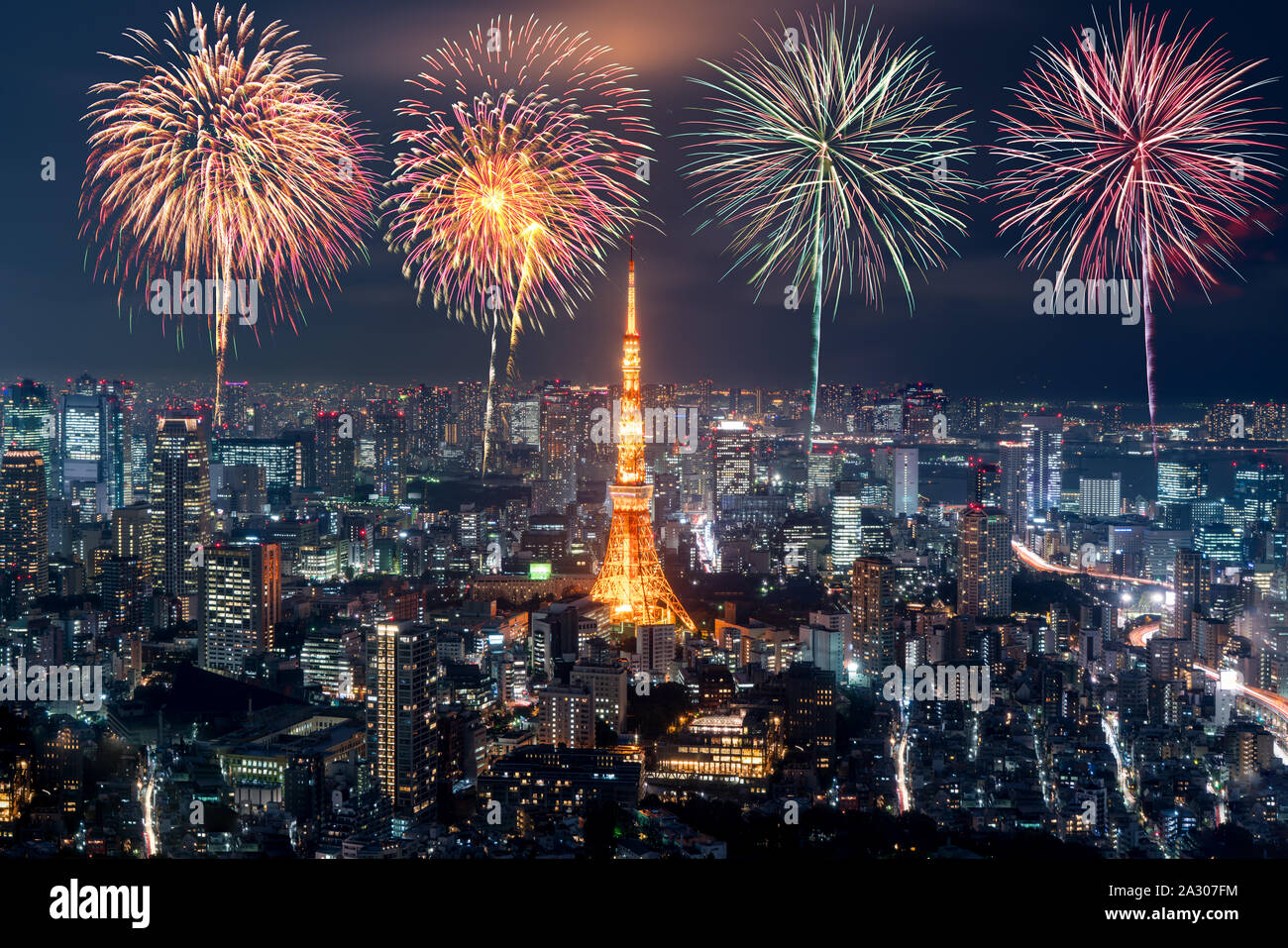 Tokyo at night, Fireworks new year celebrating over tokyo cityscape at night in Japan Stock Photo