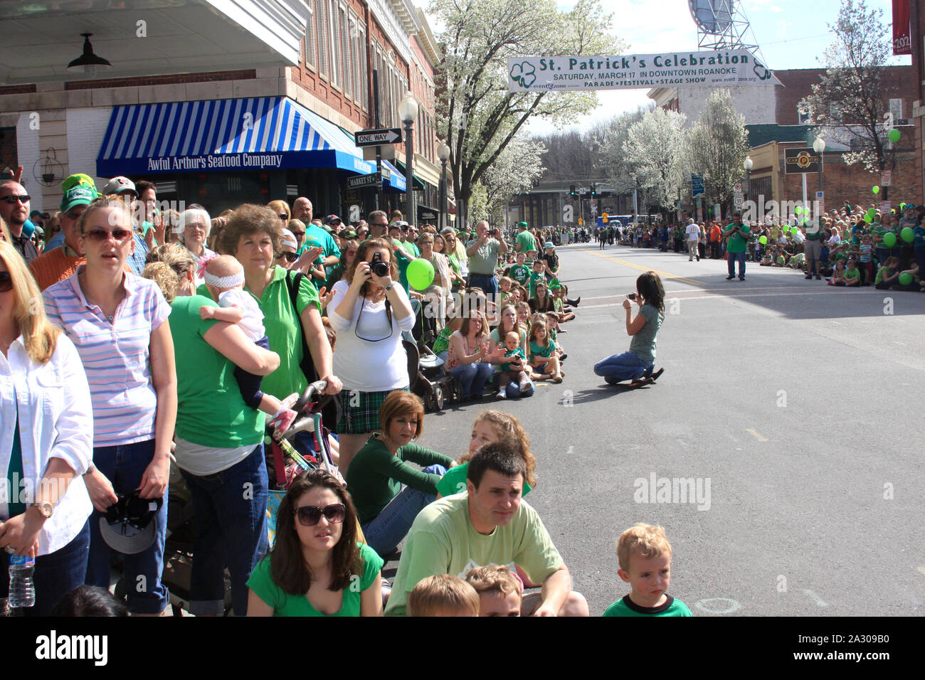 People watching the St. Patrick's Day parade in downtown Roanoke, VA
