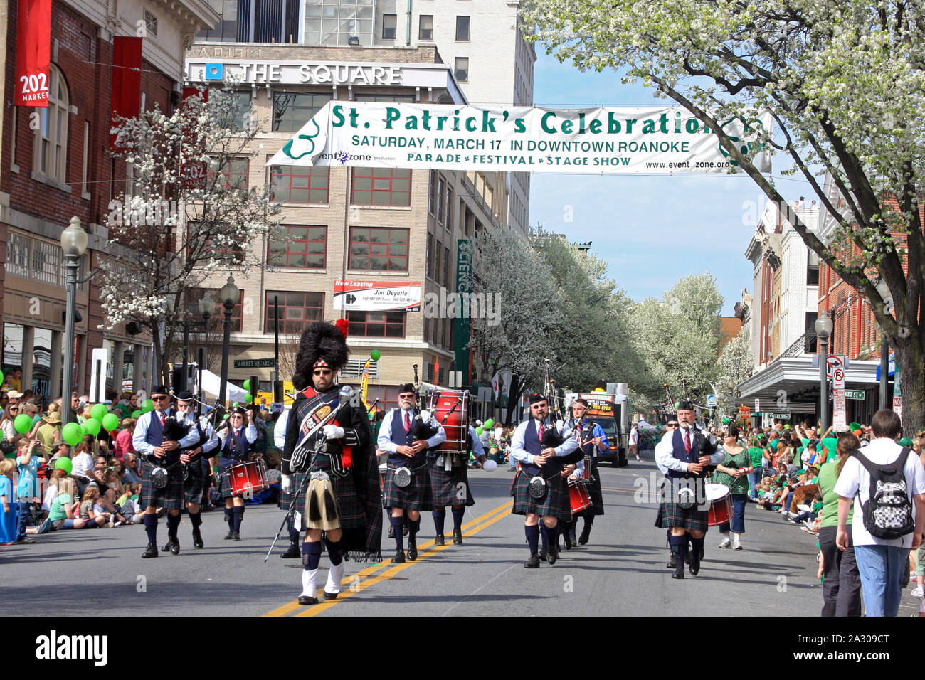 Band in traditional Celtic clothing playing music in St. Patrick's Day