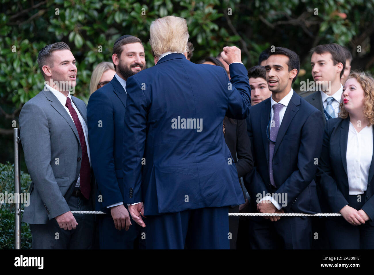 United States President Donald J. Trump greets guests as he returns to the White House in Washington, DC after signing an executive order in The Villages, Florida 'Protecting and Improving Medicare' for senior citizens on Thursday, October 3, 2019.Credit: Chris Kleponis/Pool via CNP /MediaPunch Stock Photo