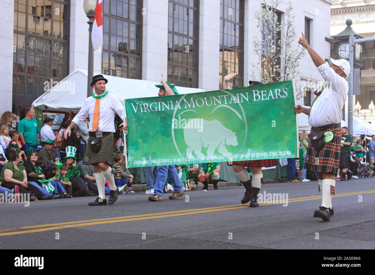 Members of the 'Virginia Mountain Bears' parading in the St. Patrick's Day in downtown Roanoke, VA, USA Stock Photo