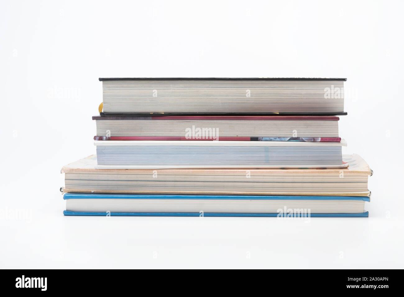 A pile of hardback books Stock Photo