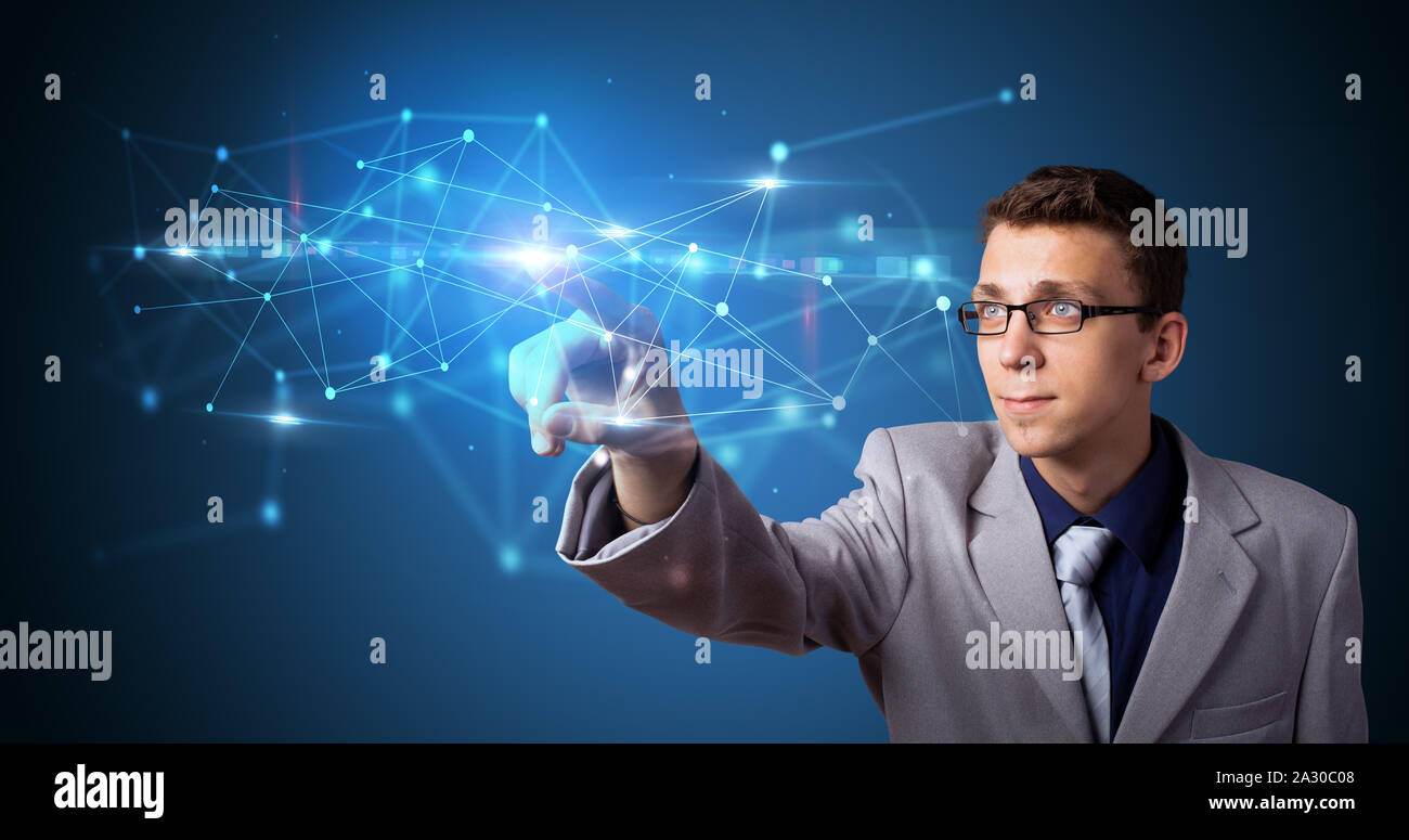 Man touching hologram screen displaying modern web system Stock Photo