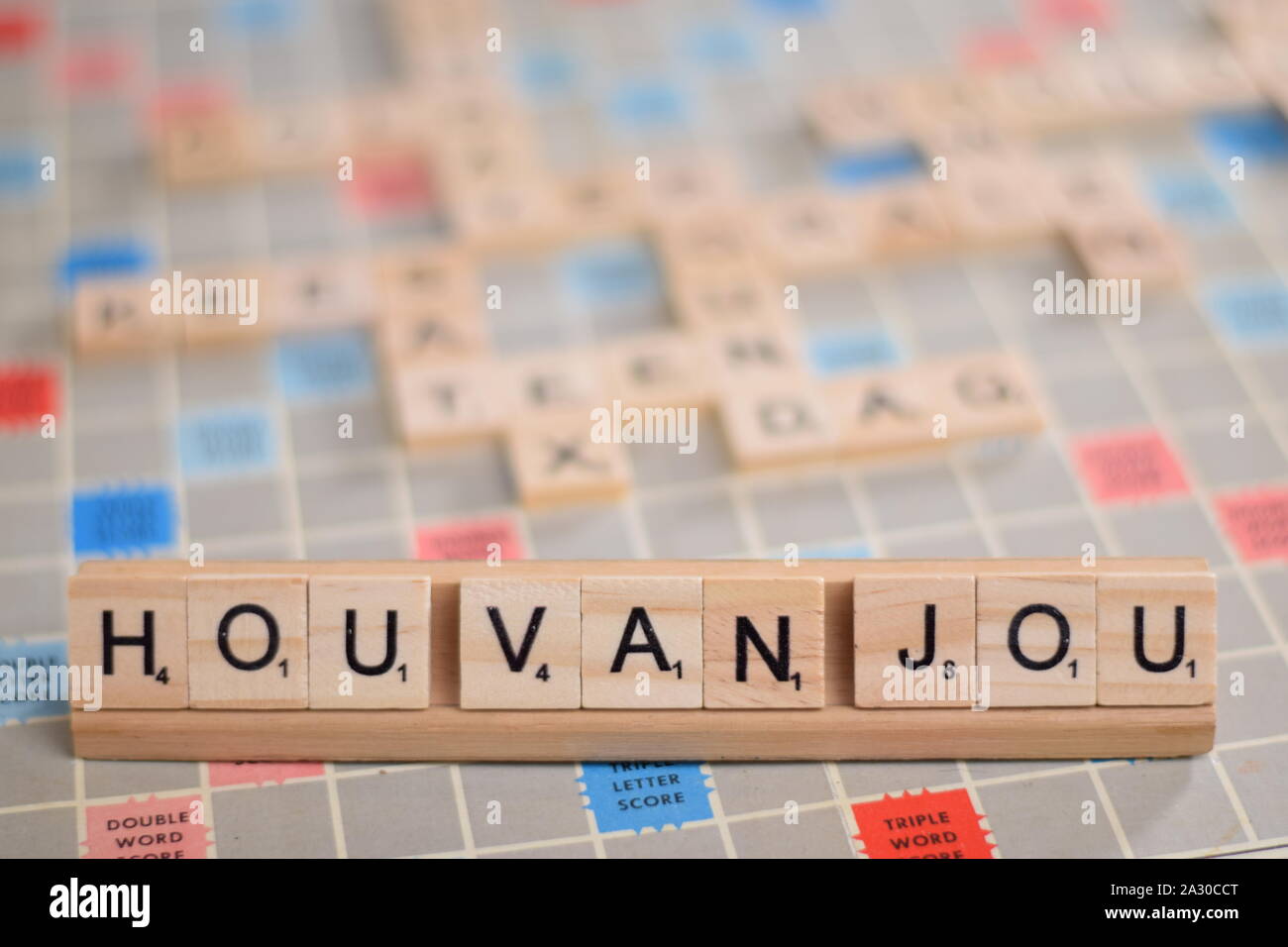 The Dutch word 'hou van jou' (in English: 'love you') in wooden scrabble  tiles on a rack. The background a vintage board, out of focus, copy space  Stock Photo - Alamy