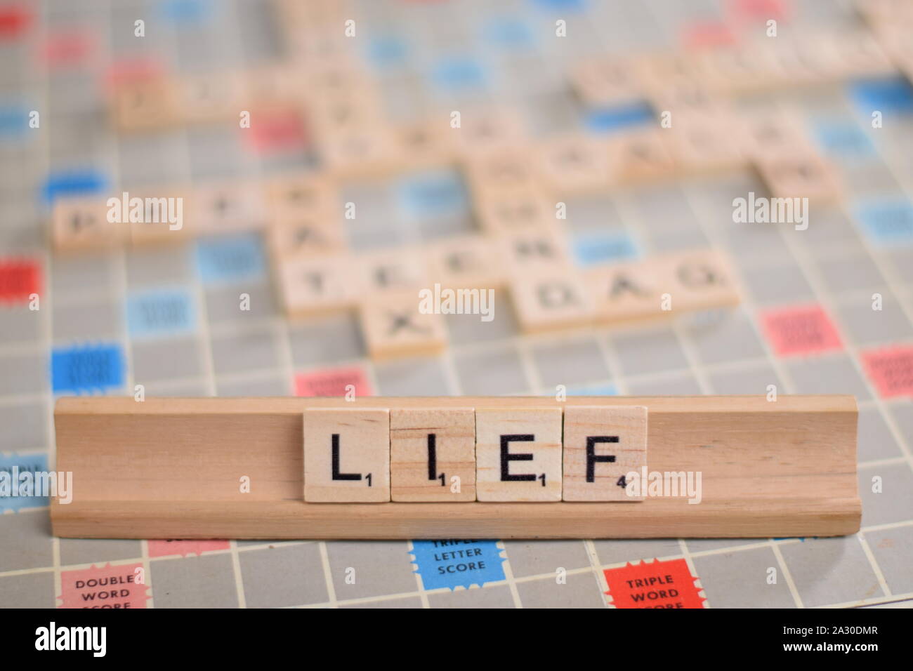 The Dutch word 'lief' (in English 'sweet') in wooden scrabble tiles on