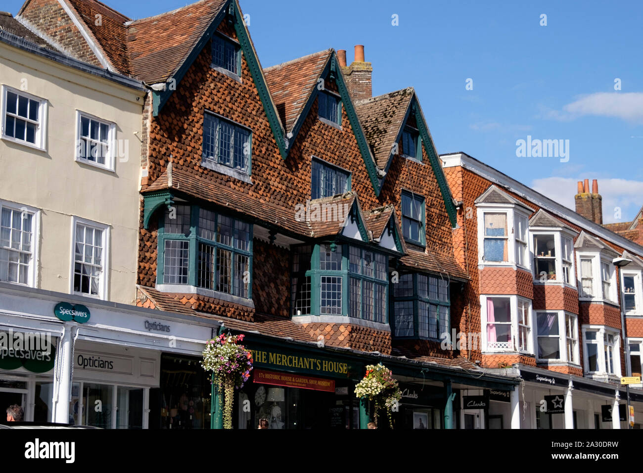 View of rooftops along the High St of Marlborough, a Market Town In Wiltshire UK. The Merchants House Stock Photo