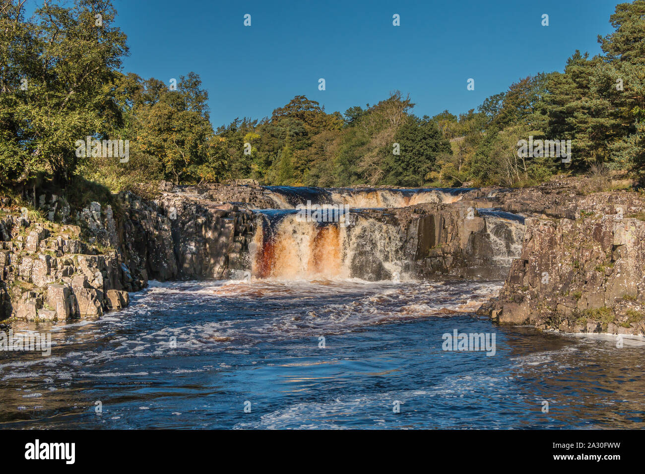 Low Force Waterfall, Upper Teesdale, UK on a perfect cloudless autumn day Stock Photo