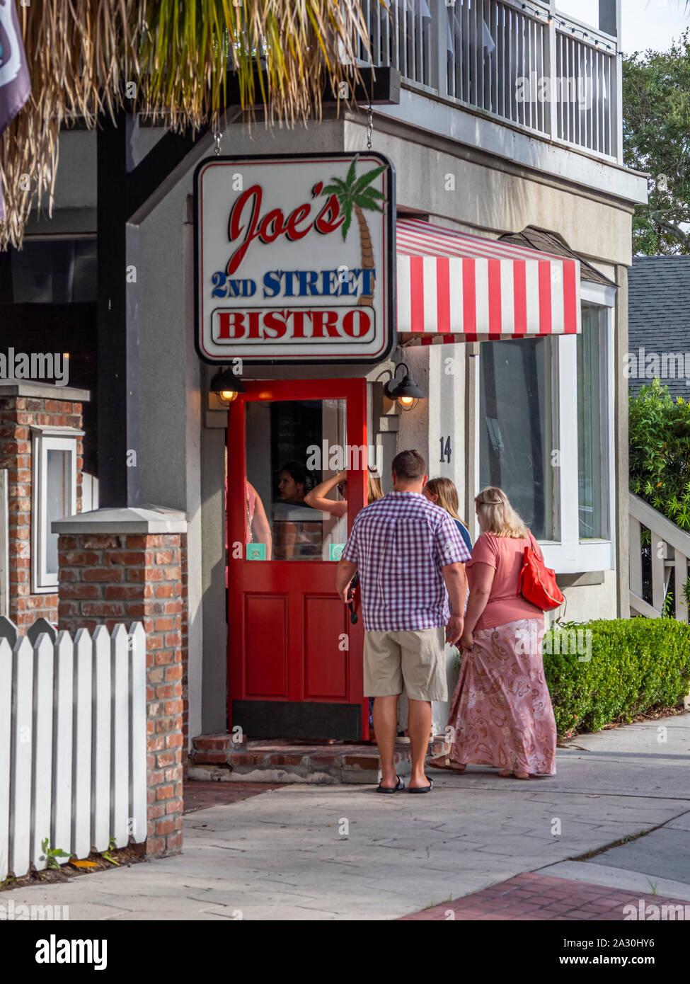 People entering restaurant in Fernandina Beach on Amelia Island Florida Stock Photo