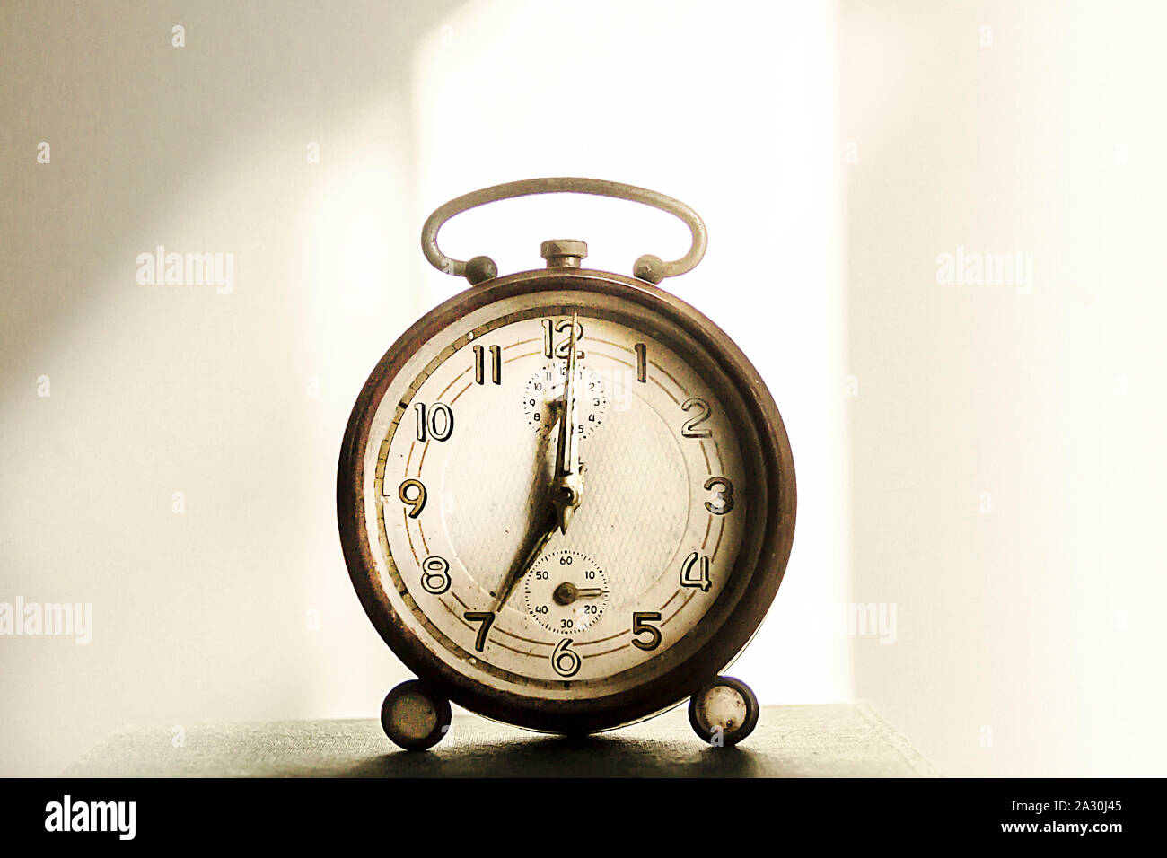 Vintage alarm clock closeup Stock Photo - Alamy