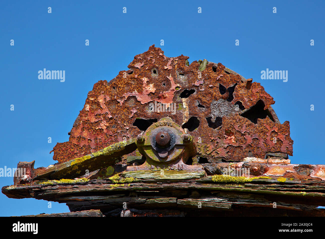 close-up detail of a rusting farm machine showing oxidisation process Stock Photo